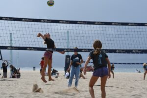 Young beach volleyball players training at MBsand Manhattan Beach